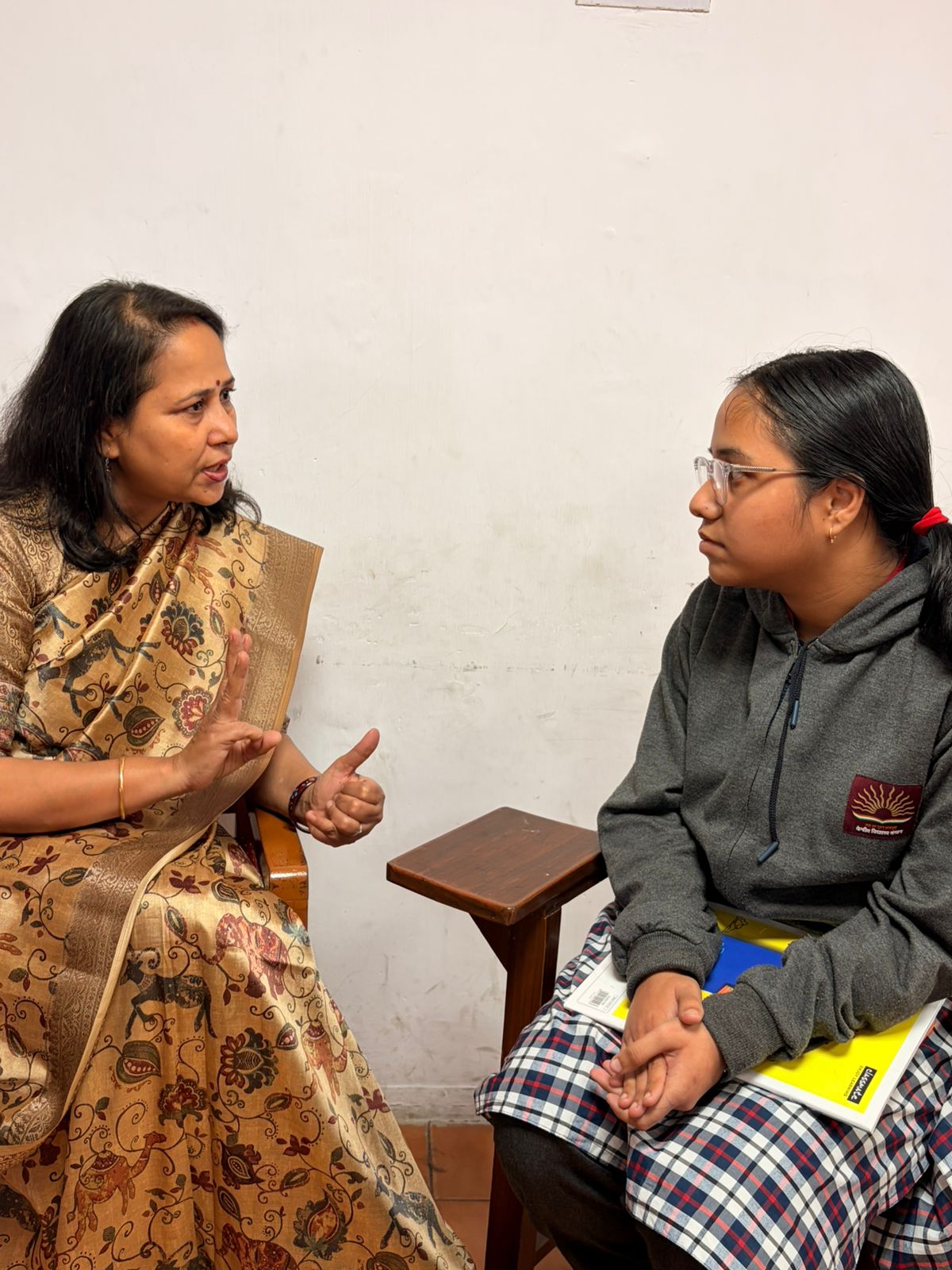 Focused students during profile-building discussion.