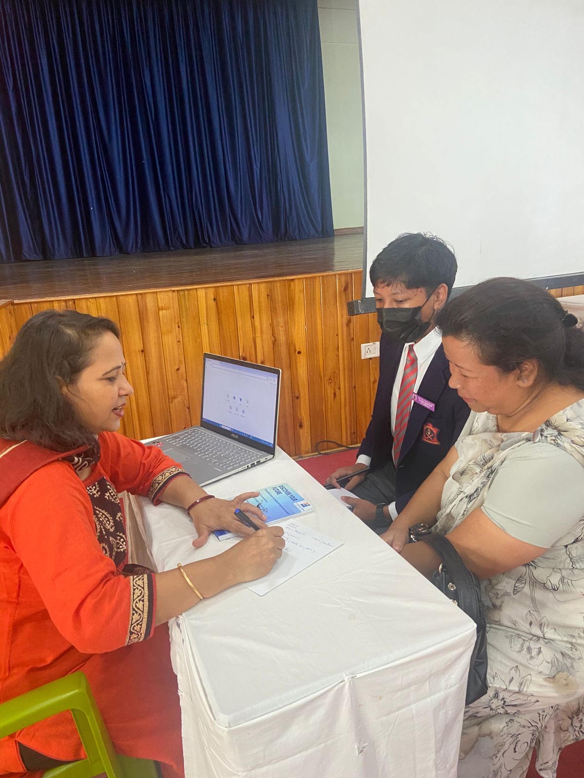 Group of students interacting with the speaker.